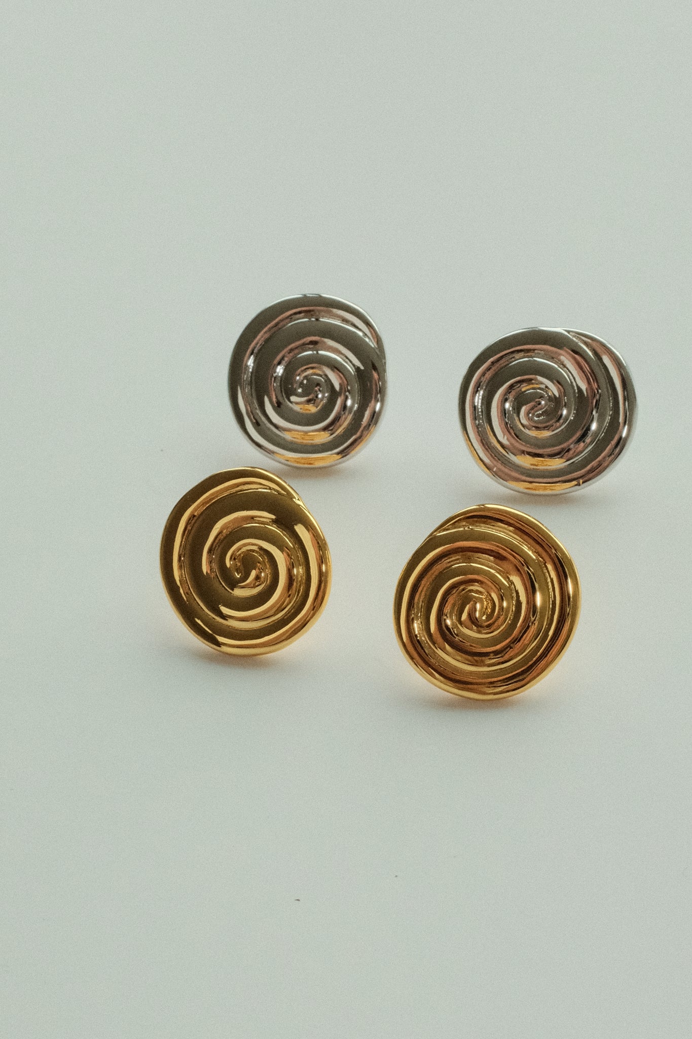 SILVER SWIRL STUDS